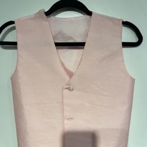 Pink Vest - slight rip in bottom